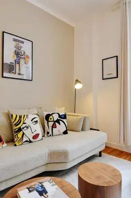 Coin salon dans l'établissement Calm Square Flat
