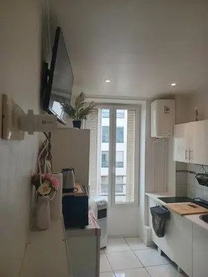 Cuisine ou kitchenette dans l'établissement Chambre proche centre ville