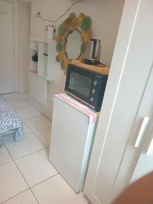 Cuisine ou kitchenette dans l'établissement Chambre proche centre ville