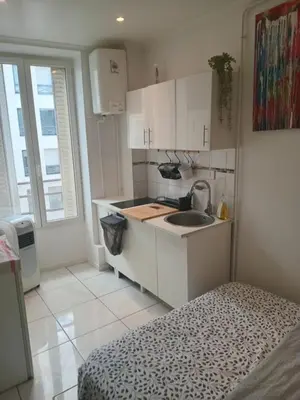 Cuisine ou kitchenette dans l'établissement Chambre proche centre ville
