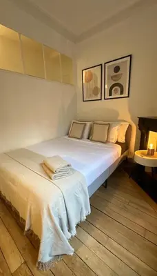 Un ou plusieurs lits dans un hébergement de l'établissement Suite 140m2 vue sur Tour Eiffel