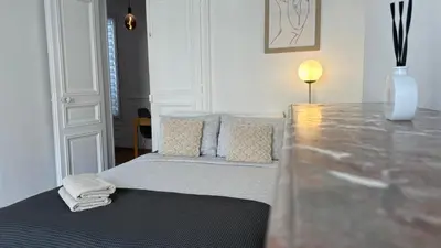 Un ou plusieurs lits dans un hébergement de l'établissement Suite 140m2 vue sur Tour Eiffel