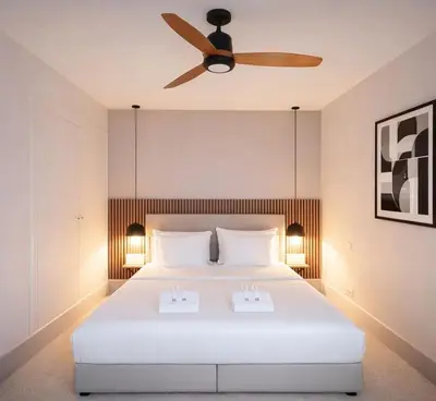 Un ou plusieurs lits dans un hébergement de l'établissement Arc de Triomphe - Premium family apartment for 5