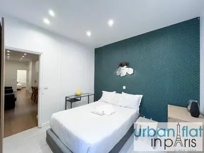 Un ou plusieurs lits dans un hébergement de l'établissement Urban Flat 35 - 2 Bedroom Apartment Grands Boulevards