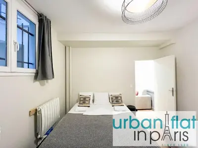 Un ou plusieurs lits dans un hébergement de l'établissement Urban Flat 07 - Opera Grands Boulevards Flat