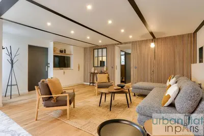 Coin salon dans l'établissement Urban Flat 170 - Amelot Apartment in Center of Paris