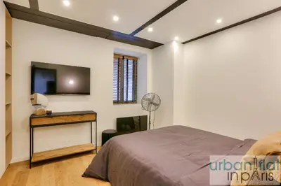 Télévision ou salle de divertissement dans l'établissement Urban Flat 170 - Amelot Apartment in Center of Paris