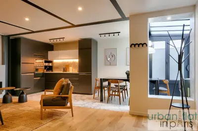 Coin salon dans l'établissement Urban Flat 170 - Amelot Apartment in Center of Paris