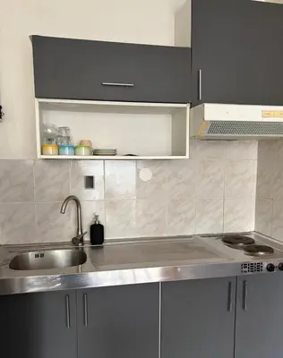 Cuisine ou kitchenette dans l'établissement Cozy Studio Ideally Located