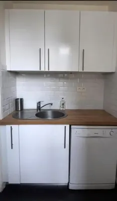 Cuisine ou kitchenette dans l'établissement Appartement 2 pièces 42m2 - Puces de Saint-Ouen