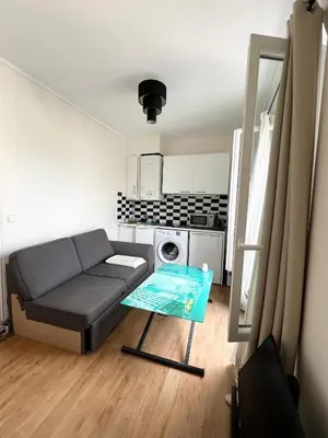 Coin salon dans l'établissement Appartement Saint Ferdinand