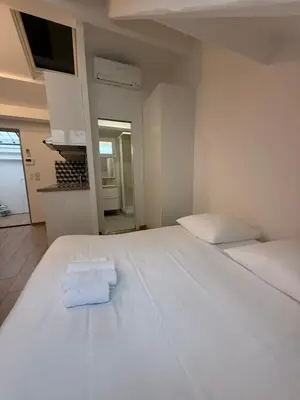 Un ou plusieurs lits dans un hébergement de l'établissement Cocoon in the 16th Eiffel Tower and Roland Garros