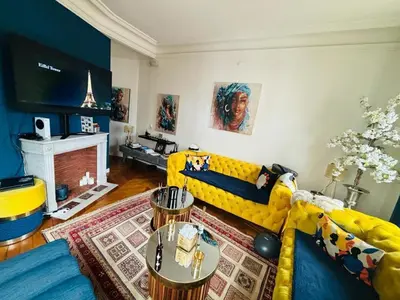 Coin salon dans l'établissement Appartement NY in Paris with love