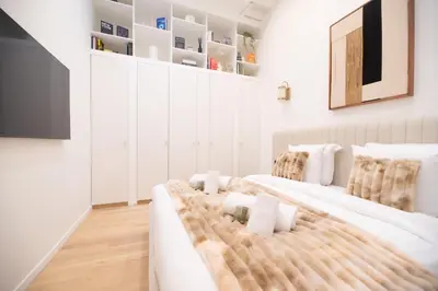 Un ou plusieurs lits dans un hébergement de l'établissement CIA - Chic Flat in Marais with AC