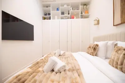 Un ou plusieurs lits dans un hébergement de l'établissement CIA - Chic Flat in Marais with AC