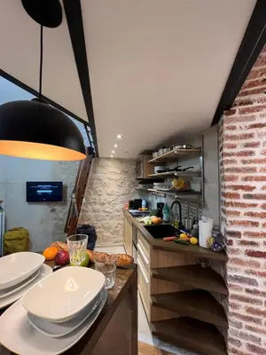 Cuisine ou kitchenette dans l'établissement Appartement 2 pièces Rue de la voûte - Bail mobilité