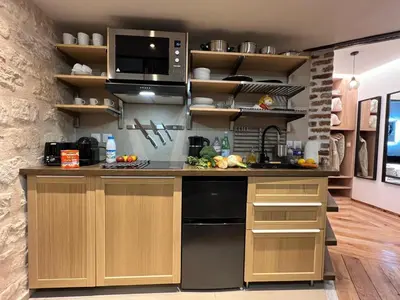 Cuisine ou kitchenette dans l'établissement Appartement 2 pièces Rue de la voûte - Bail mobilité
