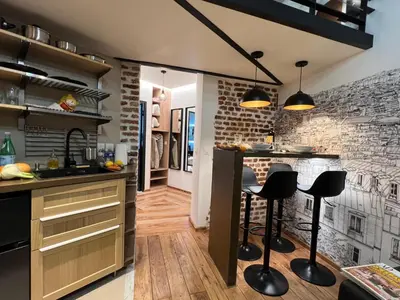 Cuisine ou kitchenette dans l'établissement Appartement 2 pièces Rue de la voûte - Bail mobilité