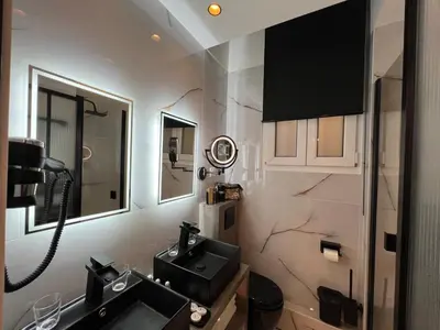 Télévision ou salle de divertissement dans l'établissement Appartement 2 pièces Rue de la voûte - Bail mobilité