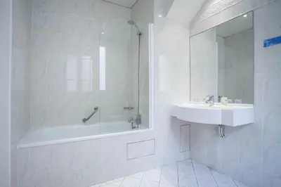 Salle de bains dans l'établissement Hotel Delambre