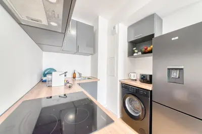 Cuisine ou kitchenette dans l'établissement Appartement prestige 5 personnes