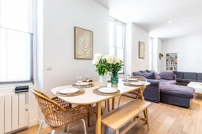 Coin salon dans l'établissement GuestReady - Elegant retreat near the Eiffel Tower