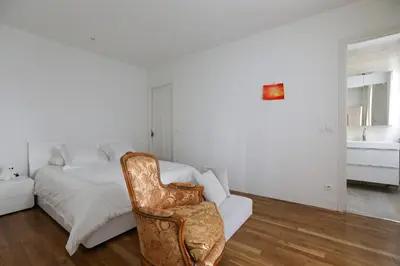 Un ou plusieurs lits dans un hébergement de l'établissement Bright apartment for 4