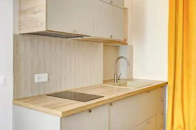 Cuisine ou kitchenette dans l'établissement Coco meulin rouge