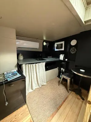 Cuisine ou kitchenette dans l'établissement La cabine du capitaine