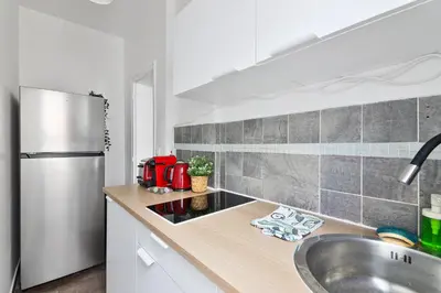 Plan de l'établissement Heart of Paris 1BR-4P Tour Eiffel 8 Free Netflix