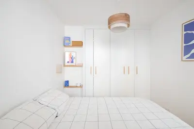 Un ou plusieurs lits dans un hébergement de l'établissement We Parisian Vanneau Cozy Home