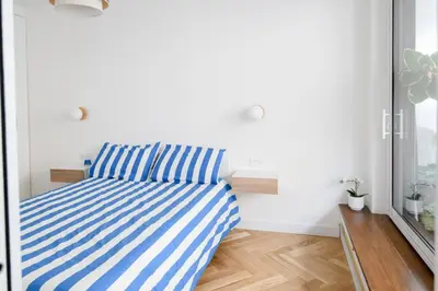 Un ou plusieurs lits dans un hébergement de l'établissement We Parisian Vanneau Cozy Home