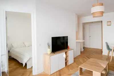 Télévision ou salle de divertissement dans l'établissement We Parisian Vanneau Cozy Home