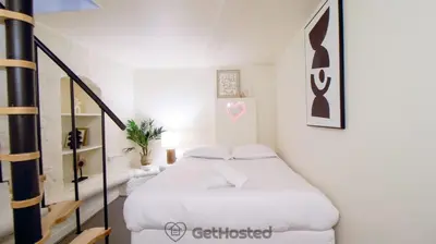 Un ou plusieurs lits dans un hébergement de l'établissement Paris Expo - Charming Apartment - GetHosted