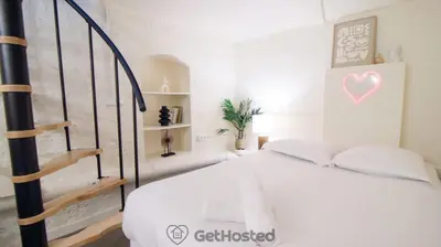 Un ou plusieurs lits dans un hébergement de l'établissement Paris Expo - Charming Apartment - GetHosted