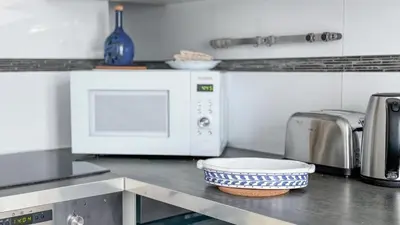Cuisine ou kitchenette dans l'établissement Escapade parisienne stylée