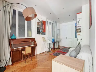 Coin salon dans l'établissement Superbe apt haussmannien 4BR 10P Parc Monceau