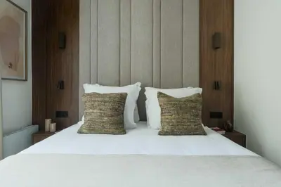 Un ou plusieurs lits dans un hébergement de l'établissement Elegant apartment - 3BR-8P- Le Marais