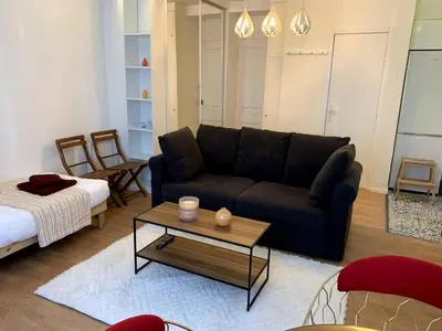 Coin salon dans l'établissement Appartement Confort - Puteaux La Défense