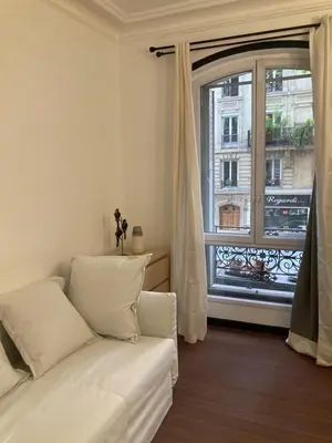 Coin salon dans l'établissement Studio meublé Gambetta
