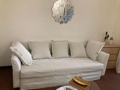 Coin salon dans l'établissement Studio meublé Gambetta