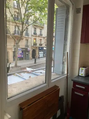 Cuisine ou kitchenette dans l'établissement Studio meublé Gambetta