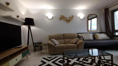 Coin salon dans l'établissement 3 bedrooms and salon, La Défense, 5 min walk Metro
