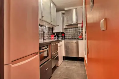 Cuisine ou kitchenette dans l'établissement Duplex de Luxe