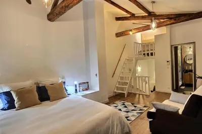 Un ou plusieurs lits dans un hébergement de l'établissement Duplex de Luxe