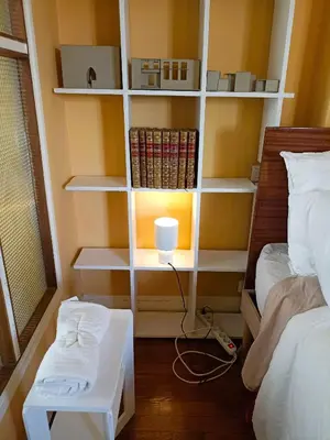 Un ou plusieurs lits dans un hébergement de l'établissement Votre pied-à-terre parisien bien connecté