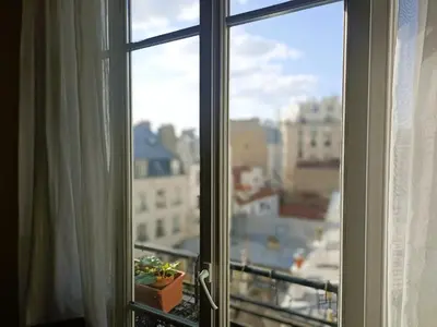 Vue générale sur Paris ou vue de la ville depuis l'appartement