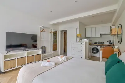 Un ou plusieurs lits dans un hébergement de l'établissement Superb Studio bien équipé Paris Montparnasse