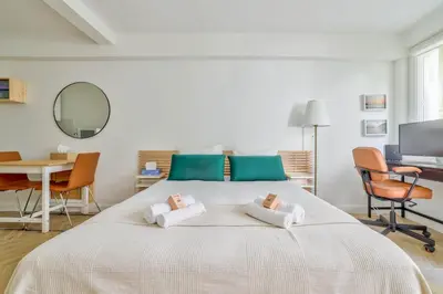 Un ou plusieurs lits dans un hébergement de l'établissement Superb Studio bien équipé Paris Montparnasse