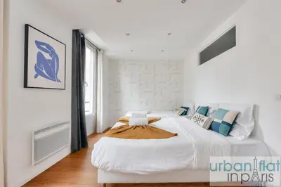 Un ou plusieurs lits dans un hébergement de l'établissement 04 Best Flat Montorgeuil 3